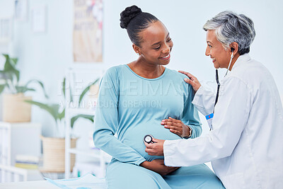 Buy stock photo Black woman, pregnant and doctor listening to heart beat in checkup, appointment or visit at hospital. Happy African female person in maternity and mature medical or healthcare professional at clinic