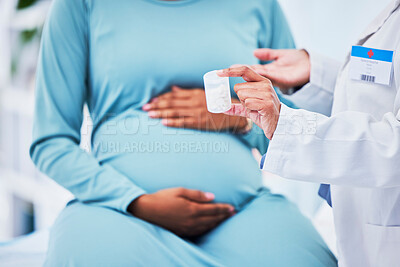 Buy stock photo Doctor, pregnant patient and hands, pills in container and woman at hospital with gynecology. Supplements, healthcare and pregnancy, medical advice and fertility, help and trust from gynecologist