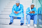 Doctor team, stairs and smartphone in hospital for telehealth, healthcare or online wellness. Phone, surgeon and people on steps on internet, reading email and medical professional research in clinic