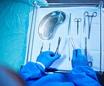 Surgery, nurse and table with tools in hospital, operation room and medical equipment with scalpel, scissors and bowl. Surgeon, hands and above doctor ready with medicine or tool for procedure