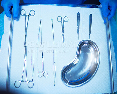 Buy stock photo Surgery, tools and medical table in hospital, operation room and equipment with scalpel knife, scissors and metal bowl. Surgeon, hands and above doctor ready with medicine or tool for procedure