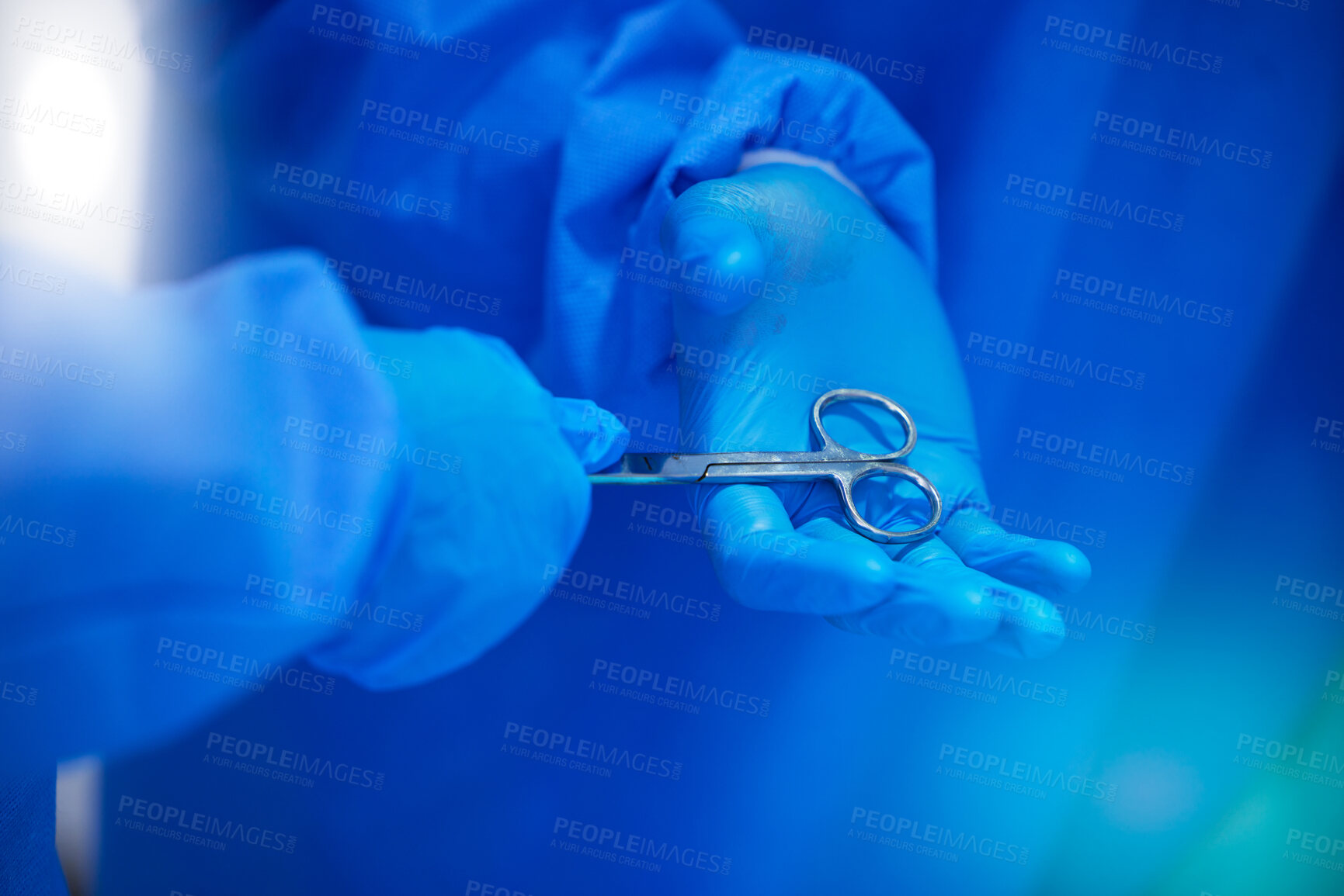 Buy stock photo Closeup, surgery and hands with a scissor for healthcare, hospital work and help. Support, team and doctors, surgeons or medical employees with gloves for cardiology or professional cooperation