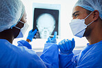 Skull xray, doctors and medical discussion for planning test results, charts and health advice for surgery analysis. Radiology, surgeons and face of neurology team check x ray, brain mri or operation