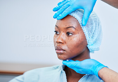 Buy stock photo Black woman, patient and doctor hands, plastic surgery and check face, health and medical consultation with beauty. Help, medicine and cosmetic procedure, exam and healthcare with people at hospital