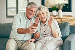 Wave, phone and video call with old couple on sofa for streaming, social media or communication. Network, internet and happy with senior man and woman in living room at home for hello and mobile app