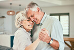 Holding hands, smile or happy old couple dancing for love or joy in marriage at home together. Hug, romantic elderly man or senior woman bonding with smile or care in retirement or house living room