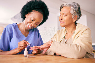 Buy stock photo Nursing home, manicure and a caregiver with a senior woman for a grooming or beauty treatment. Happy, spa and an African nurse with nail polish for a patient in a house for painting nails together