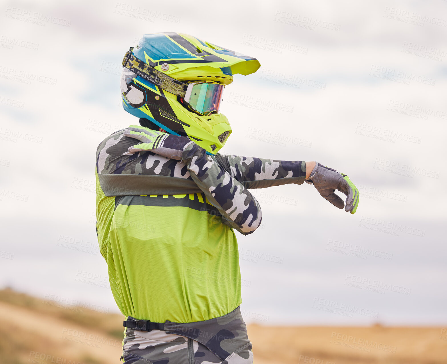 Buy stock photo Motor sports, stretching and man with helmet in nature for training, workout and performance for race. Travel, motorbike and person outdoors ready for action for adventure, freedom and adrenaline