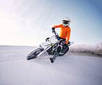 Bike, sand and speed with a man on mockup riding a vehicle in the desert for adventure or adrenaline. Motorcycle, training and freedom with an athlete on space in nature for power or extreme sports