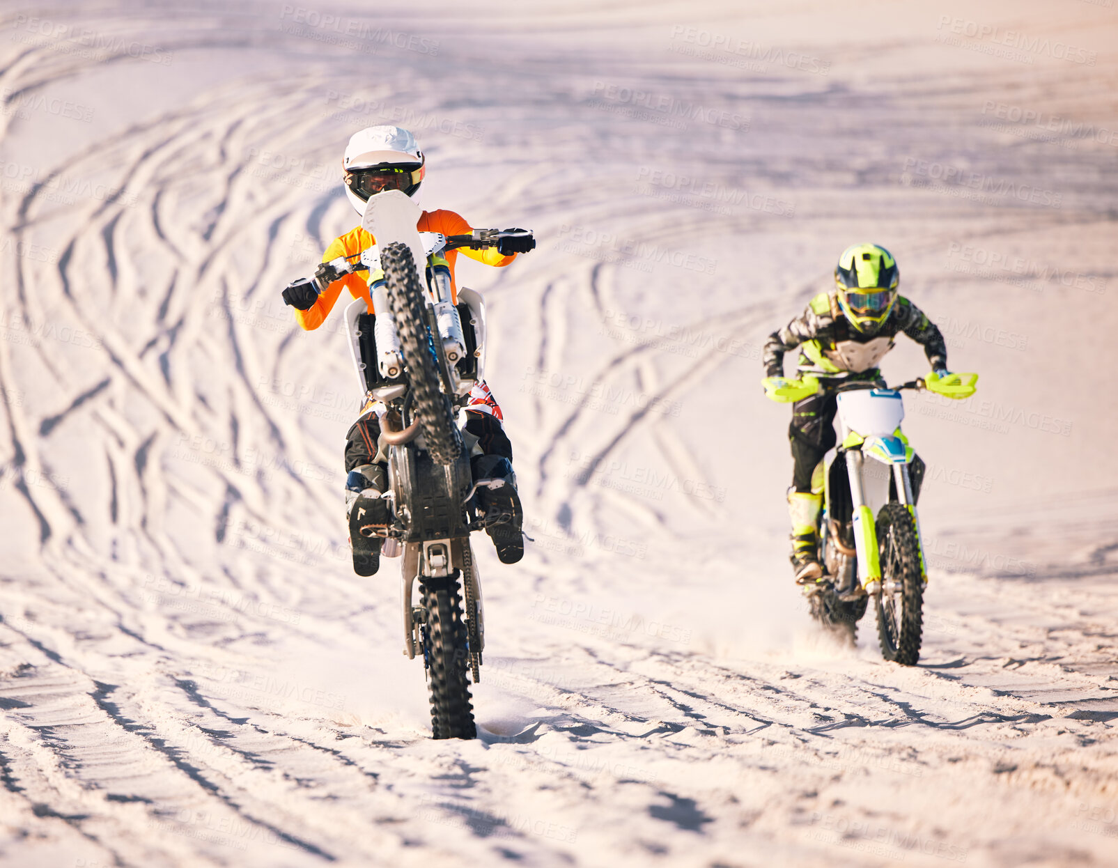 Buy stock photo Dune, desert race and men on motorbike together for practice, training and extreme sports energy in nature. Professional dirt biking challenge, friends and danger with off road motorcycle competition