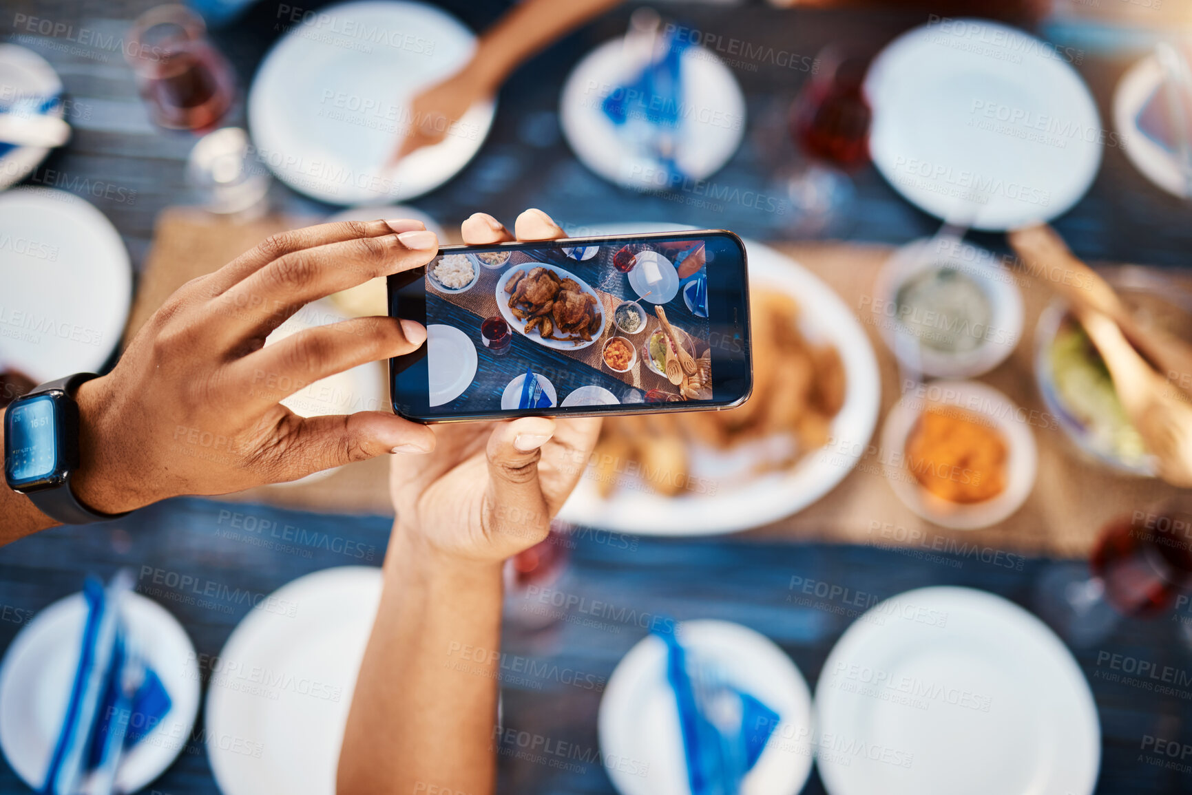 Buy stock photo Selfie, phone screen and hands, food and table, nutrition and influencer with blog, social media and technology. People have meal together, memory and lunch date with mobile app and content creation 
