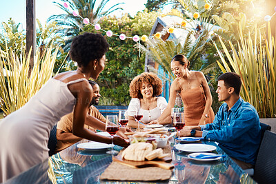 Buy stock photo Friends, outdoor and eating food at a table for social gathering, happiness and holiday celebration. Diversity, men and women group at lunch, party or reunion with wine in a garden for fun and relax