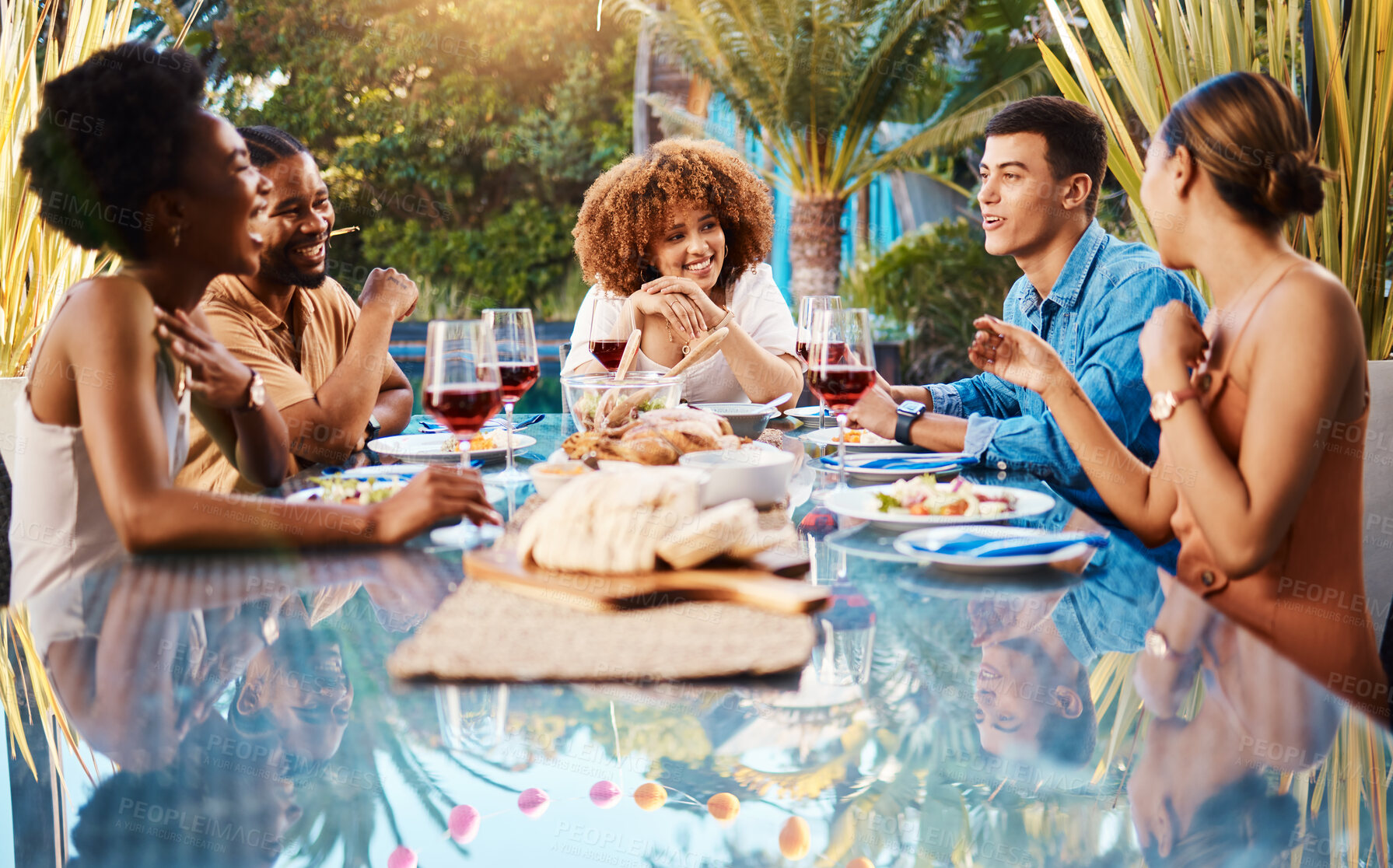 Buy stock photo Friends, food and outdoor table for holiday, Christmas or thanksgiving lunch and wine at backyard patio. Young people or social group with alcohol, brunch and drink or talking of summer vacation