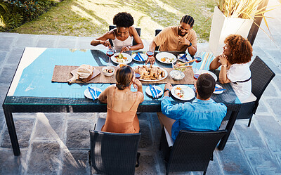 Buy stock photo Food, top and people in house backyard to relax on holiday celebration or vacation in summer together. Party, home or happy friends eating to bond at table in conversation for lunch or brunch meal