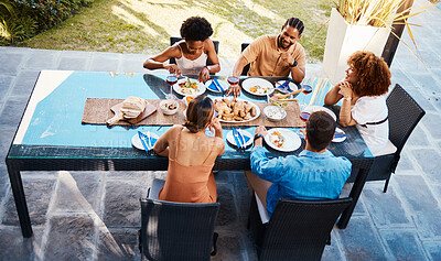Buy stock photo Food, top and friends in house backyard to relax on holiday celebration or vacation in summer together. Party, home or happy people eating to bond at table in conversation for lunch or brunch meal