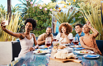 Buy stock photo Friends in selfie at lunch in garden, food and wine at happy event with diversity in outdoor bonding together. Photography, men and women at dinner party table, people eating with drinks in backyard.