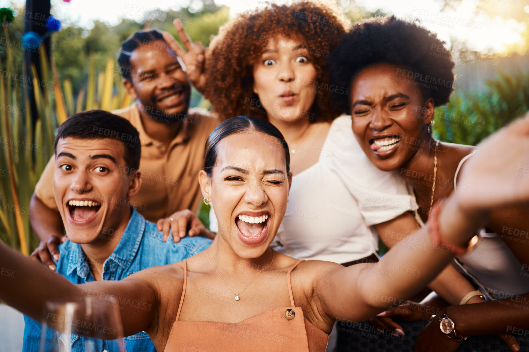 Buy stock photo Portrait, funny and selfie of friends at restaurant, bonding and happy memory together. Face smile, group and profile picture at cafe with wink, peace sign and tongue out for laughing on social media