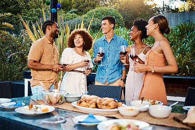Buy stock photo Chat, friends at dinner in garden at party and celebration with diversity, food and wine at outdoor event. Conversation, men and women at table, fun people with sunset drinks in backyard together.