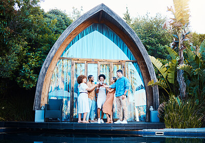 Buy stock photo Garden lodge, glamping and friends cheers at a cabin with luxury accommodation and forest cottage. Travel, holiday and people relax at destination in Bali for vacation and freedom at resort pool