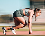 Start, running and fast with woman on race track for fitness, speed and marathon exercise. Competition, health and workout with runner training in stadium for energy, sports and cardio performance