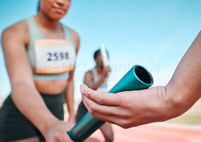 Buy stock photo Woman, team and hands with baton in relay, running marathon or sports fitness on stadium track. Closeup of people holding bar in competitive race, sprint or coordination for teamwork or performance