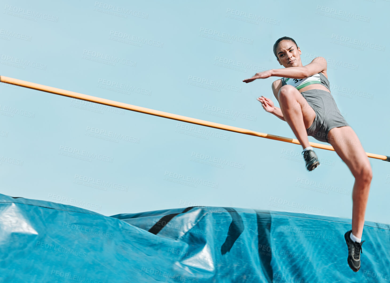 Buy stock photo High jump, woman and sport with exercise, cardio and athlete in competition outdoor. Jumping, workout and training for performance with action, energy and contest with female person and mockup space