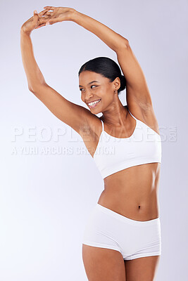 Buy stock photo Skincare, health and woman in studio stretching for healthy body, wellness and exercise results. Fitness, lose weight and happy person on white background in underwear for diet, detox or stomach care