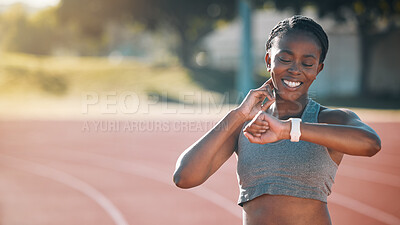 Buy stock photo Time, watch and exercise with a woman outdoor on a track for running, training or workout. African athlete person at stadium for goals, fitness and body wellness or check pulse for progress and space