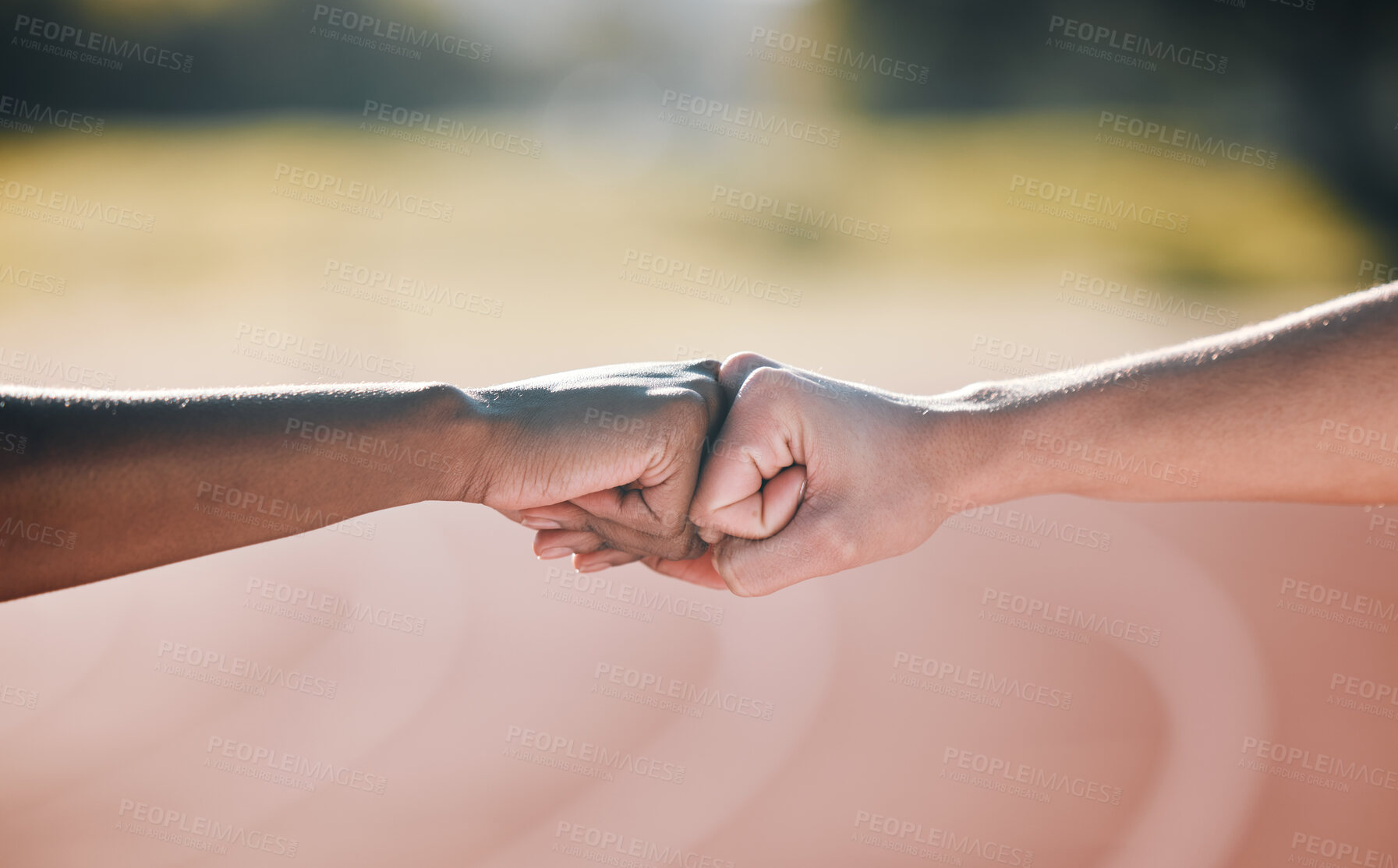 Buy stock photo Closeup, fitness and fist bump for sports support, motivation and goal in training. Stadium, together and people with a gesture or hands for workout or exercise solidarity for a race or competition