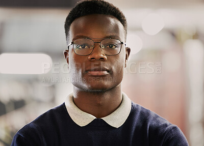 Buy stock photo Student, university and portrait of black man on campus for learning, education and vision for future career. Face of African person in library with glasses for research, school project and studying