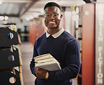 Student, university and portrait of black man in library for learning, education and reading books. Academy, college and happy African person with textbooks for research, school project and studying