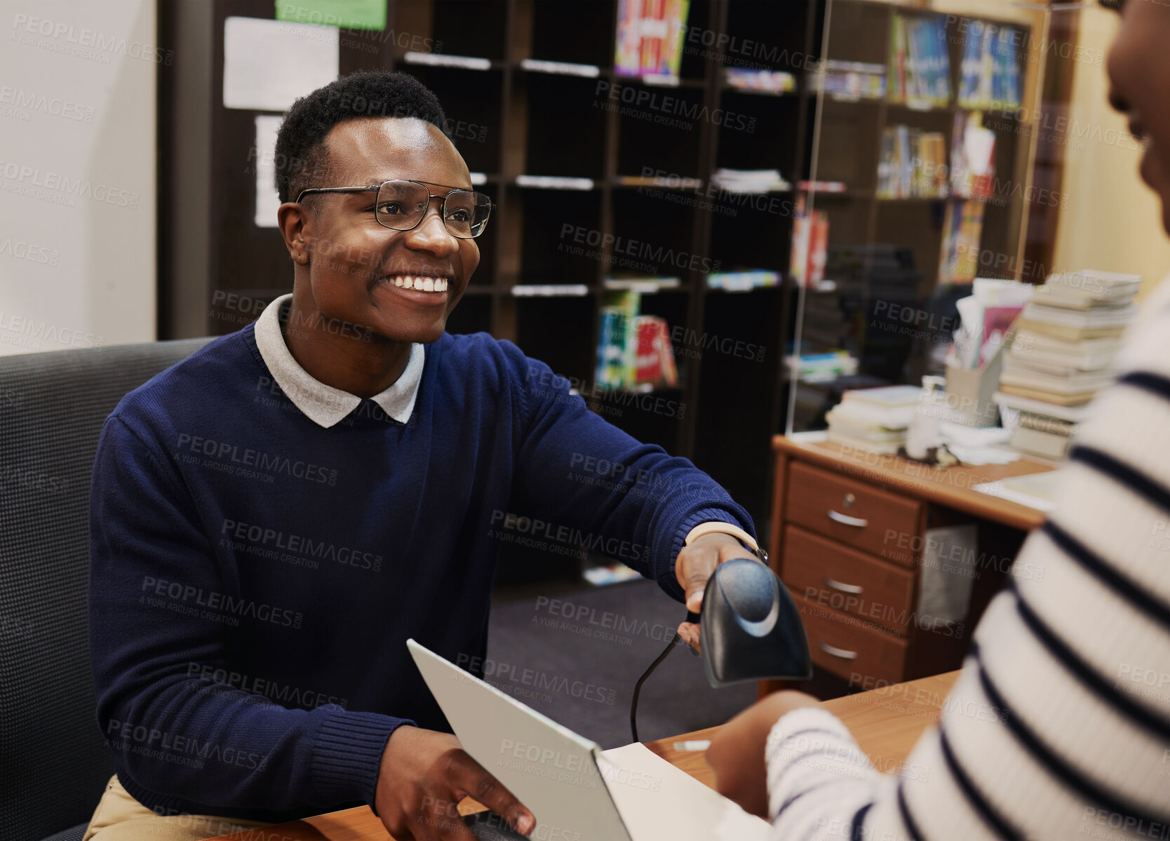 Buy stock photo Happy librarian man, scan books and help desk for learning, knowledge and administration with technology. African people, library employee and receptionist for study, information and education