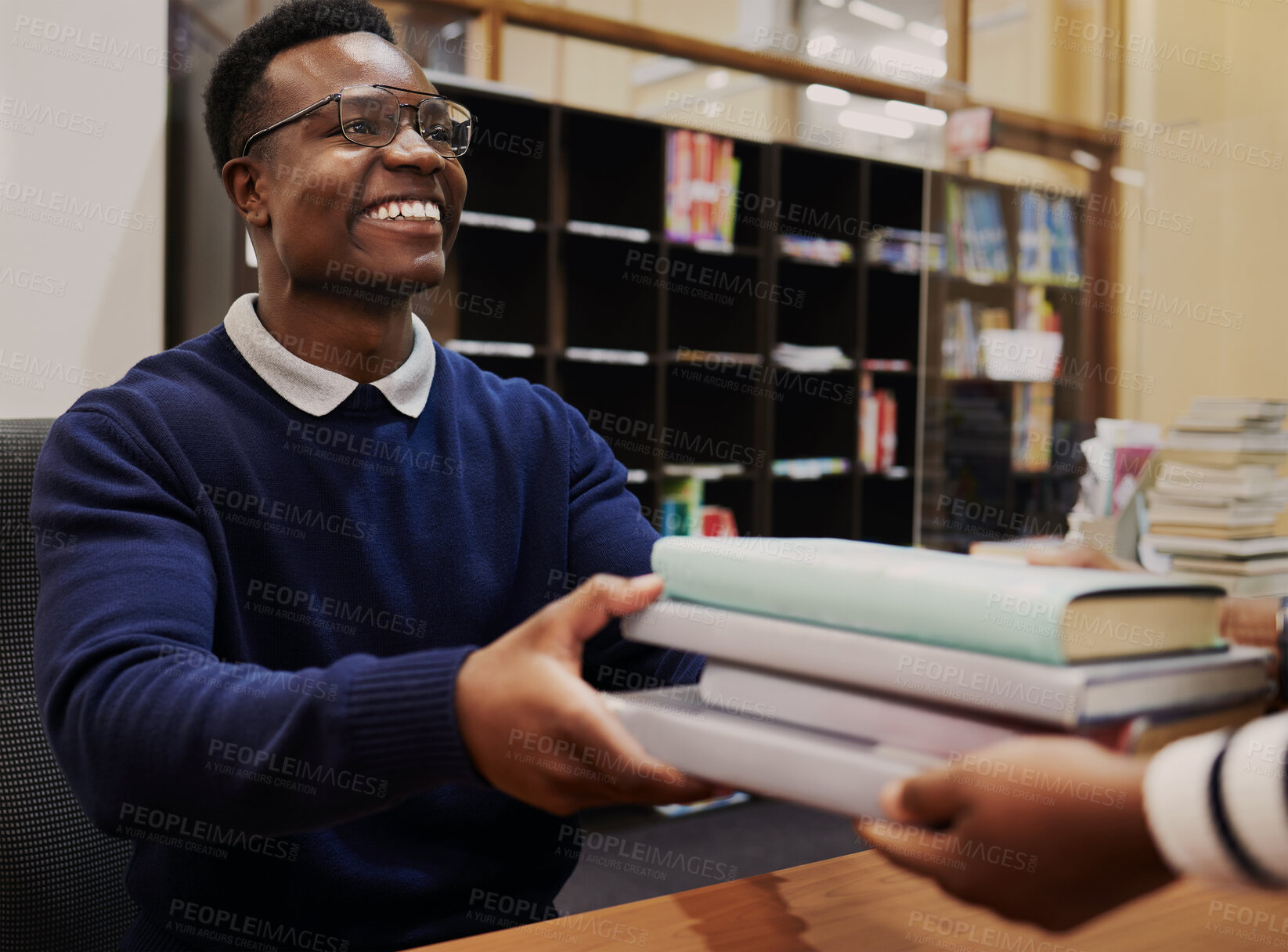 Buy stock photo Librarian man, reception desk and books with smile, learning or hands for care, knowledge or administration. People, library employee or secretary for study, info or staff for education at university