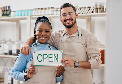 Buy stock photo Open sign, partnership and team in small business or grocery store happy for service in a retail shop with board. Smile, management and portrait of entrepreneur ready for operations with billboard