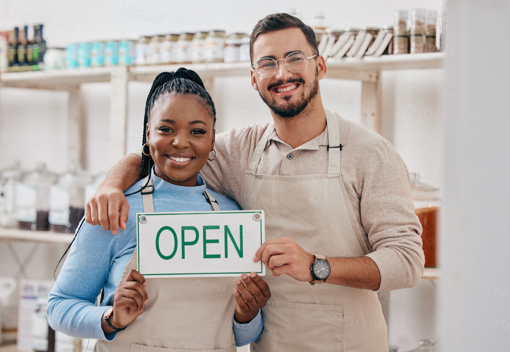 Buy stock photo Open sign, partnership and team in small business or grocery store happy for service in a retail shop with board. Smile, management and portrait of entrepreneur ready for operations with billboard