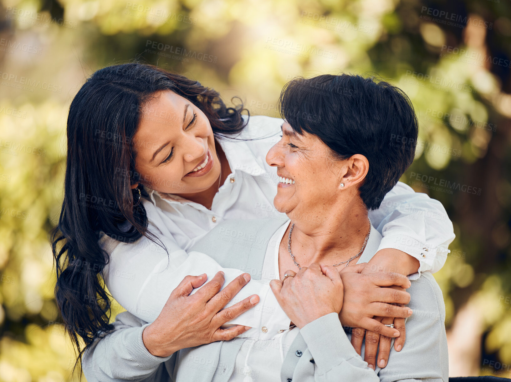 Buy stock photo Daughter, mature woman and hug in garden with love on mothers day or women bonding with care for mom in retirement. Happy, family and embrace in outdoor, backyard or together on holiday or vacation