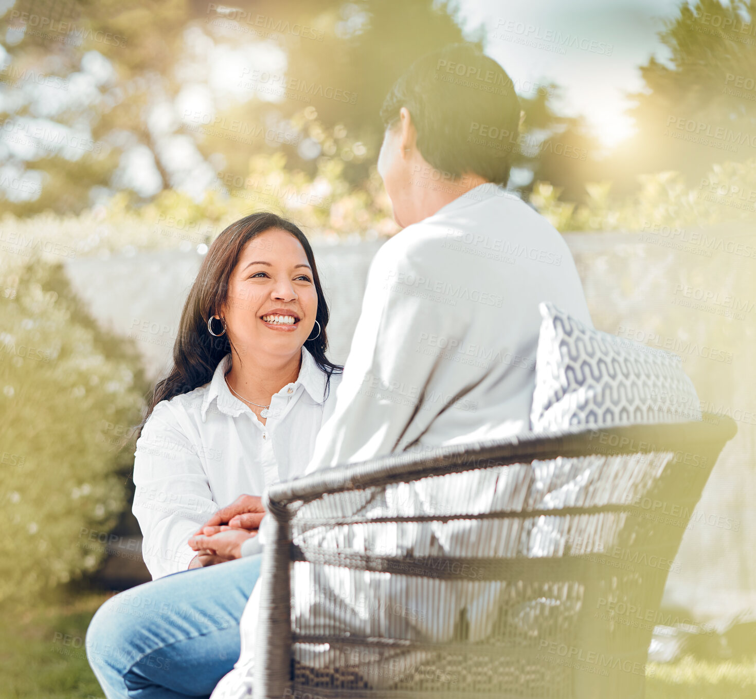 Buy stock photo Woman, mature mother or talking in garden on mothers day or women bonding for support or love. Holding hands, retirement or mom with a happy daughter in outdoor backyard together on holiday vacation