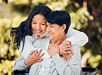 Woman, hug and mature mother in garden with love on mothers day or women bonding with care for mom in retirement. Happy, family and embrace outdoor, backyard or together on holiday or vacation