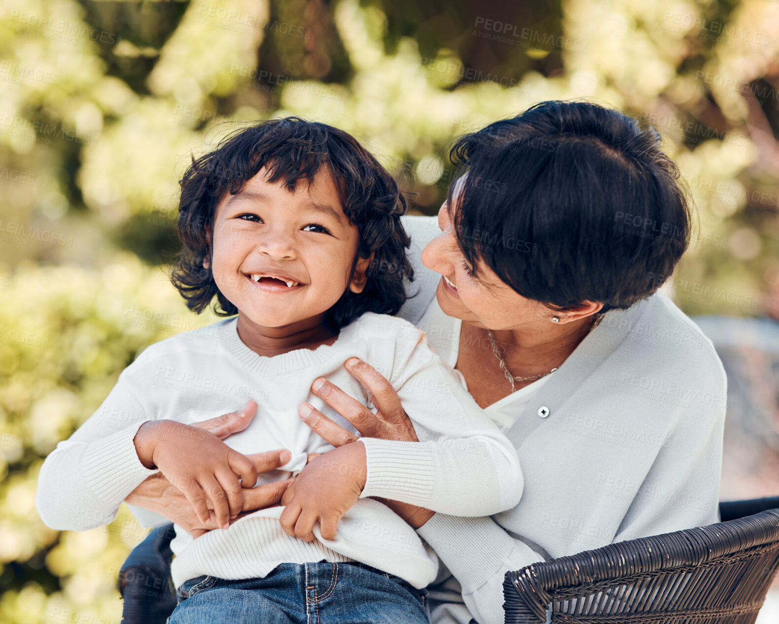 Buy stock photo Boy, hug and mature woman in park for bonding, support and summer break in Mexico nature. Kid, happy or excited child with grandmother on garden bench for love, trust and together in backyard embrace