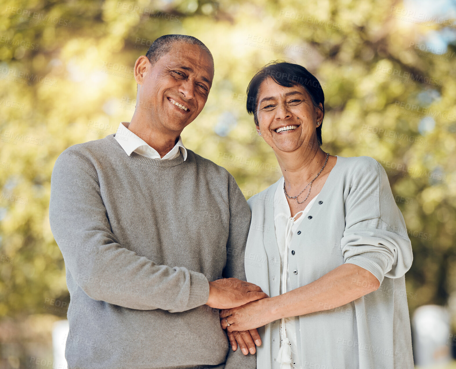 Buy stock photo Portrait, outdoor and senior couple holding hands, love and smile with support, relationship and romance. Marriage, old man and mature woman in a park, loving together and retirement with bonding