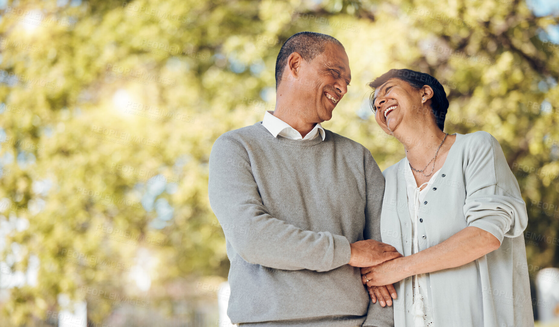 Buy stock photo Outdoor, funny and senior couple holding hands, love and happiness with joy, romance and relationship. People, elderly man and old woman in a park, nature and romantic with marriage, memory and care