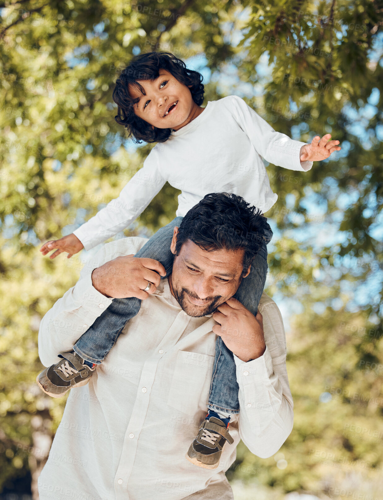 Buy stock photo Father, fun or piggyback with child in park for bonding, games or trust in backyard garden. Smile, happy or playing dad carrying boy kid on shoulders with parent, family or support activity in nature