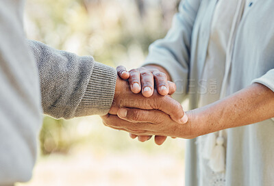 Buy stock photo Senior couple, holding hands and love with support in outdoor, nature or bonding in backyard with care, comfort or kindness. Helping, hand and people in retirement together with empathy and trust