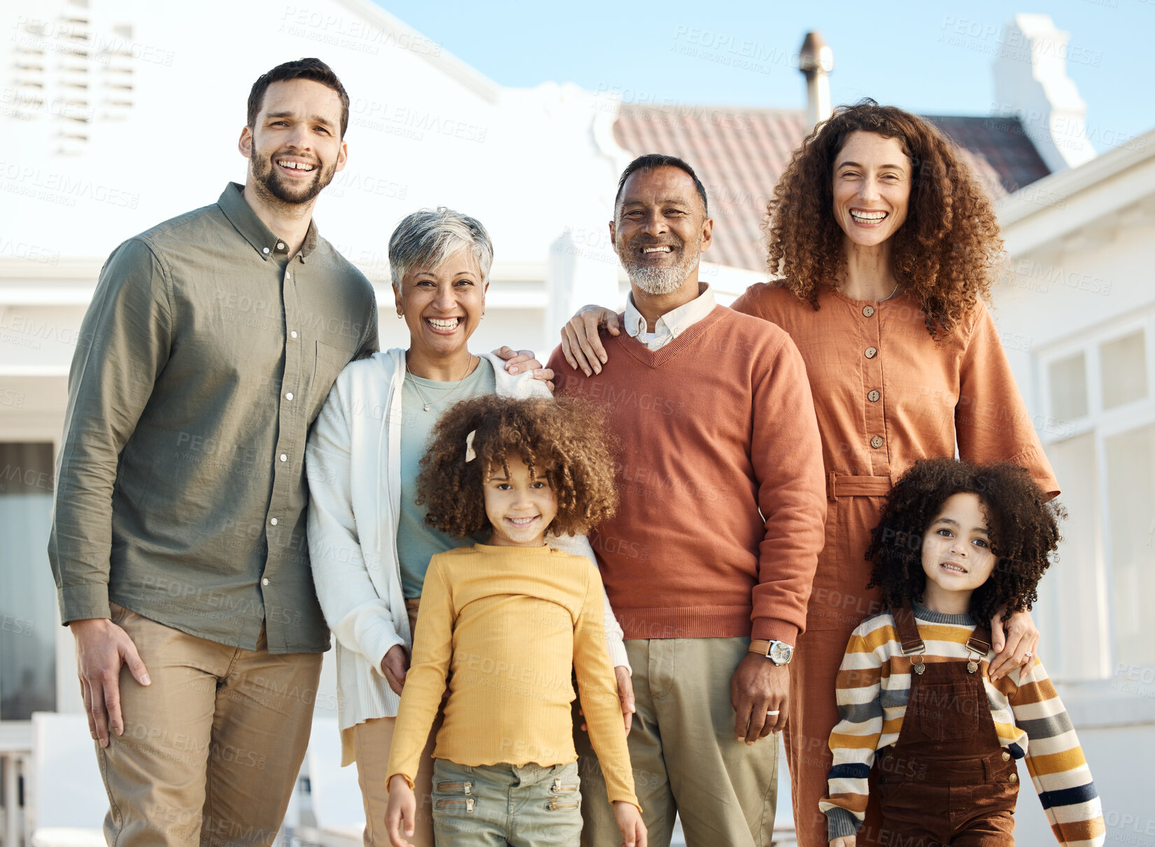 Buy stock photo Parents, children and grandparents in portrait, backyard or smile together for love, bonding or outdoor in sunshine. Mother, dad and kids in interracial big family, happy or excited at holiday house