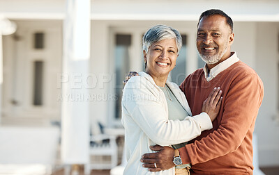 Buy stock photo Portrait, mature couple and smile by home, bonding and having fun together. Happy face, Indian man and woman in healthy relationship, connection and support in trust for love in retirement at house