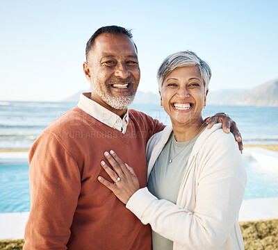 Buy stock photo Senior couple, hug and portrait at the beach, love and care with bonding, travel and trust in a marriage. Life partner, ocean and adventure in nature, people on holiday with retirement and happiness