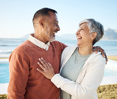 Buy stock photo Beach, laughing and happy senior couple on vacation or holiday together with love in nature at the sea or ocean. Elderly, man and woman relax with happiness, care and smile on retirement bonding 