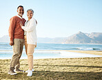 Beach, mockup and happy senior couple on vacation or holiday together with love in nature at the sea or ocean. Elderly, man and portrait of woman relax with happiness, care on retirement bonding 