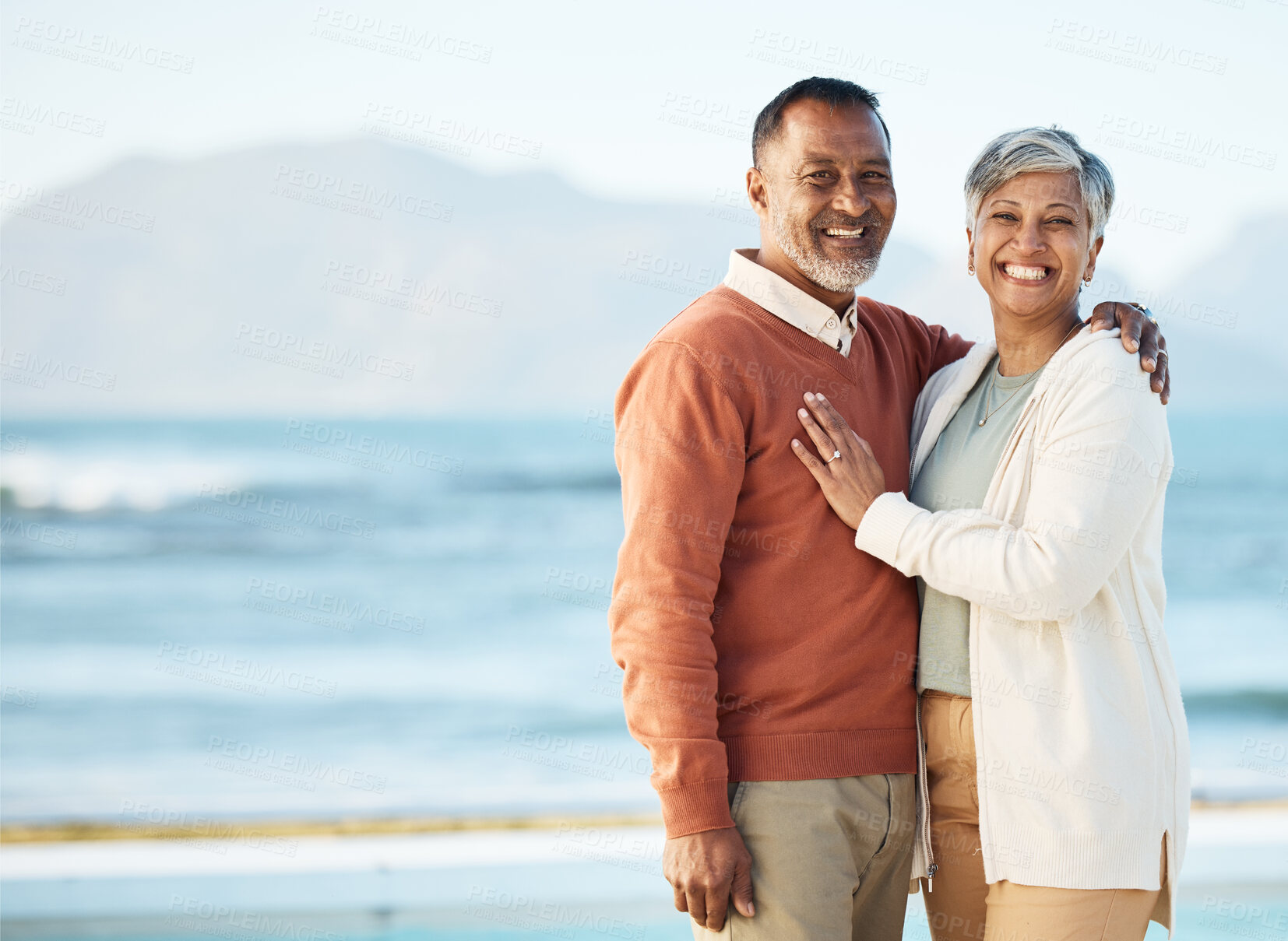 Buy stock photo Beach, mockup and portrait of senior couple on vacation or holiday together and happy with love in nature at sea. Elderly, man and woman relax with happiness, care and smile on retirement bonding 