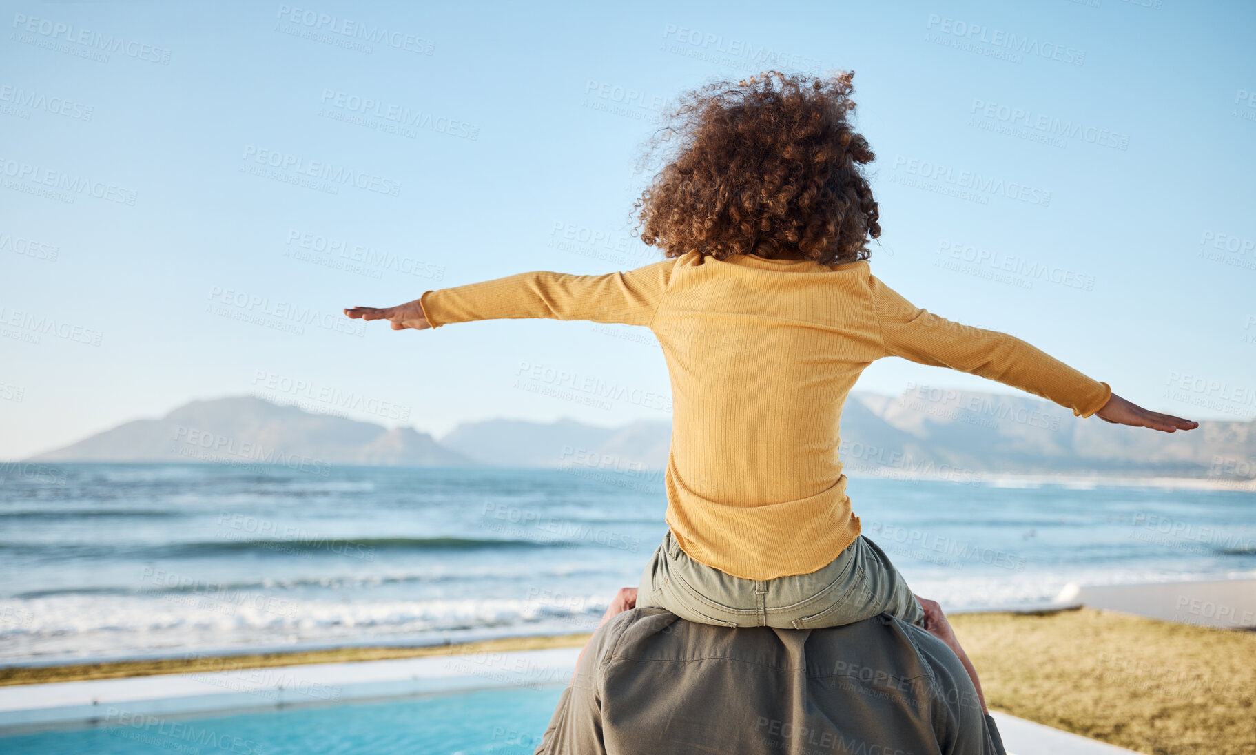 Buy stock photo Father, child on shoulders and freedom at beach, bonding and piggyback, fun and games with back view. Man, young girl and playing, summer and care, love and adventure with parenting and childhood